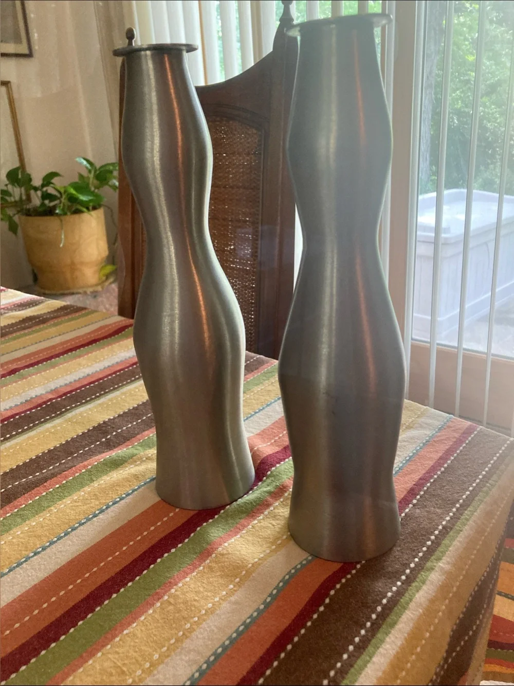 Sleek mod brushed metal candleholders. Look new